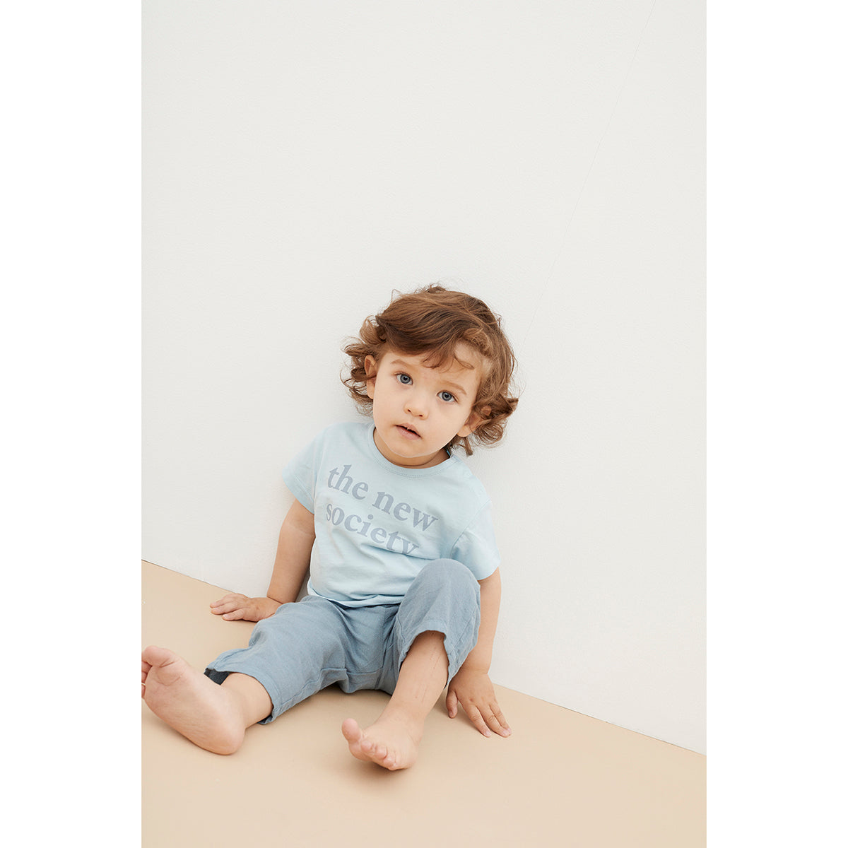 The New Society Logo Print Baby Tee