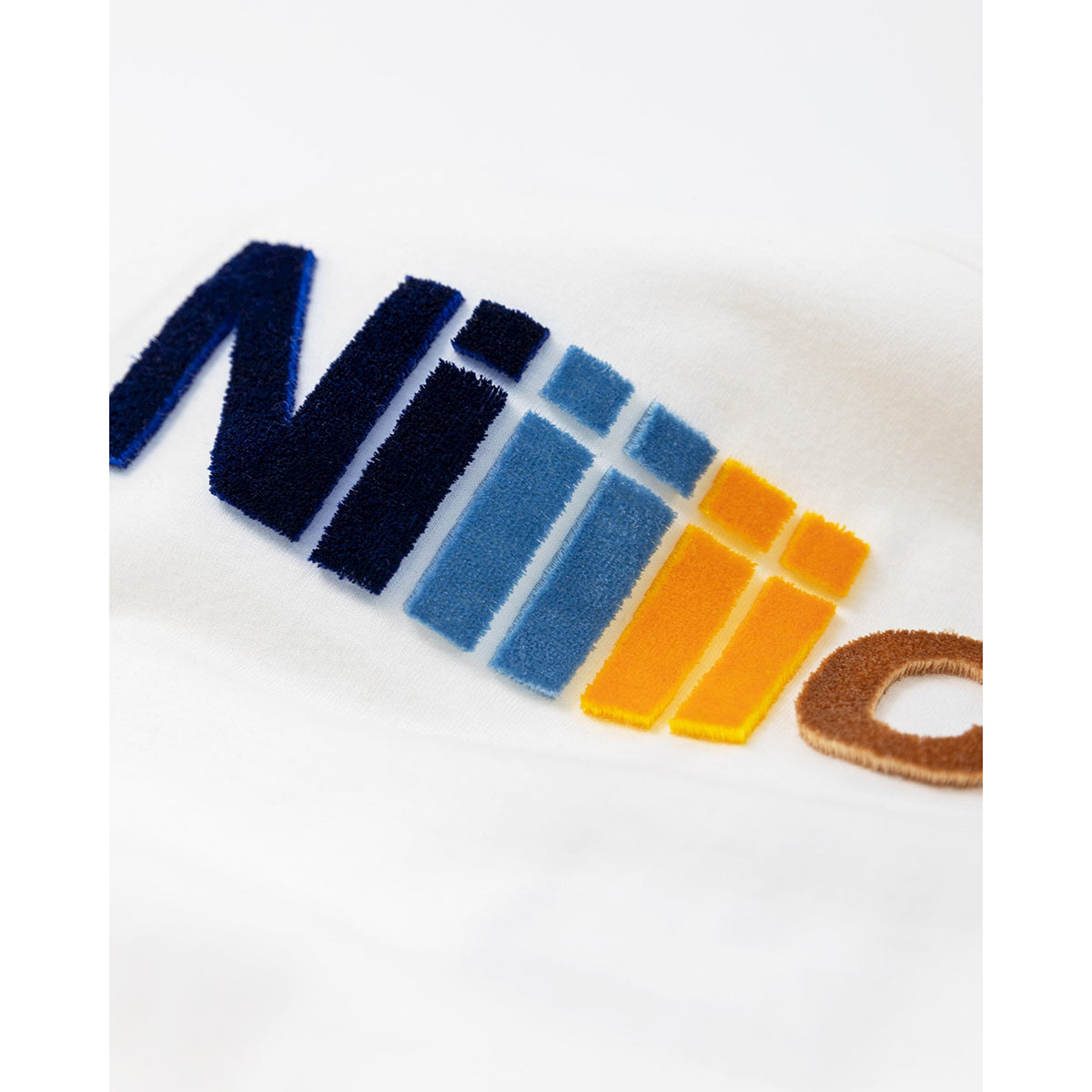 white cotton t-shirt with 'nice' print in 'toothbrush' technique from ao76 for kids and teens