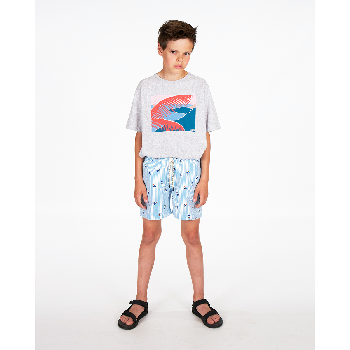 toucan swim shorts with blue and white stripes with a relaxed fit in polyester with a mesh-lined inner for kids and teens from ao76