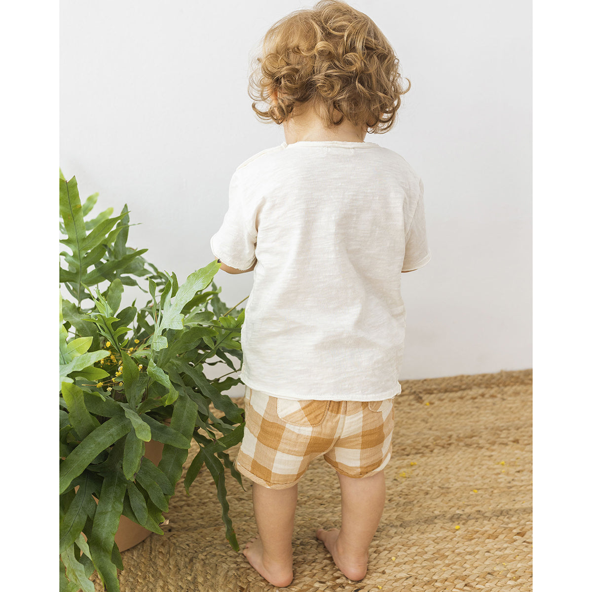 best team front print on cotton t-shirt from búho in the colour white/ecru for babies and toddlers