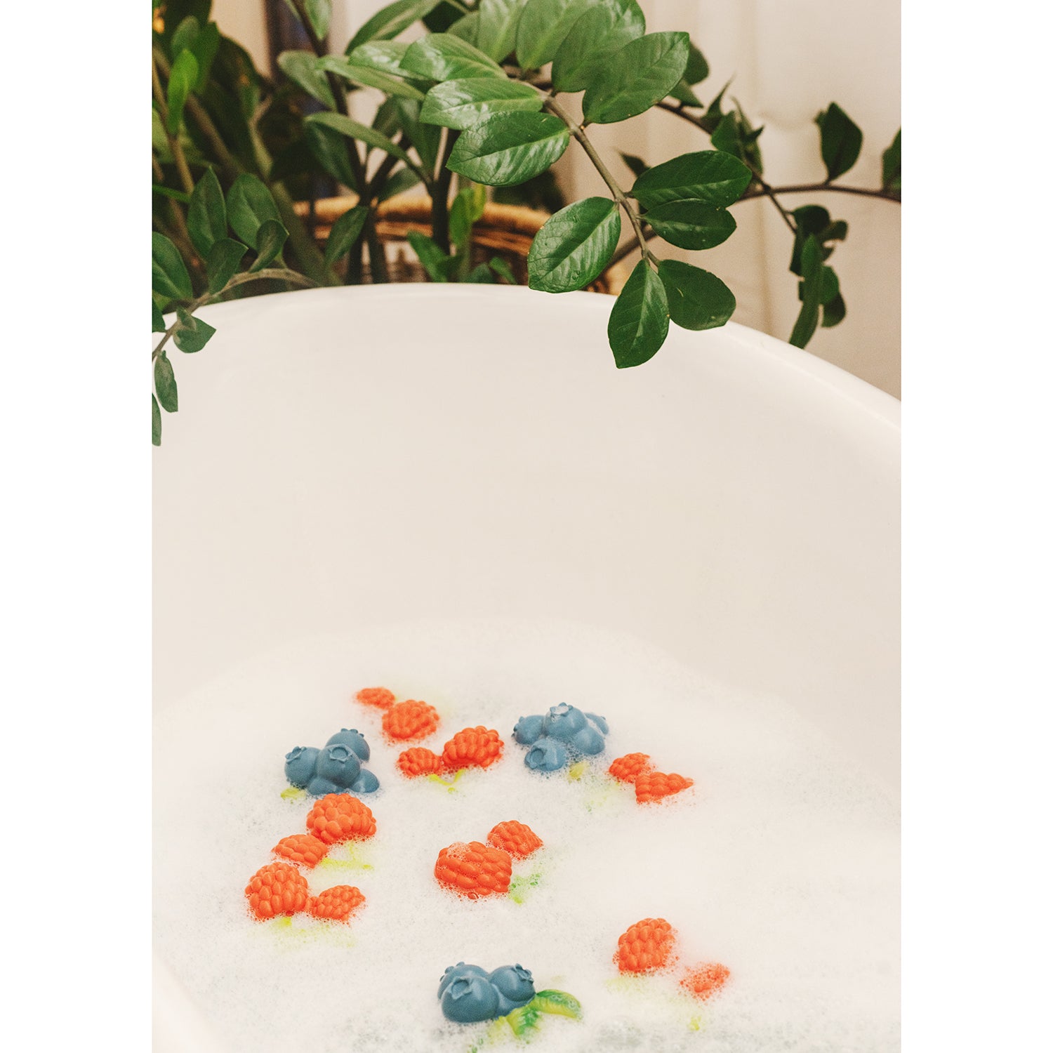 fruit teether and bath toy in the shape of a raspberry from Oli & Carol