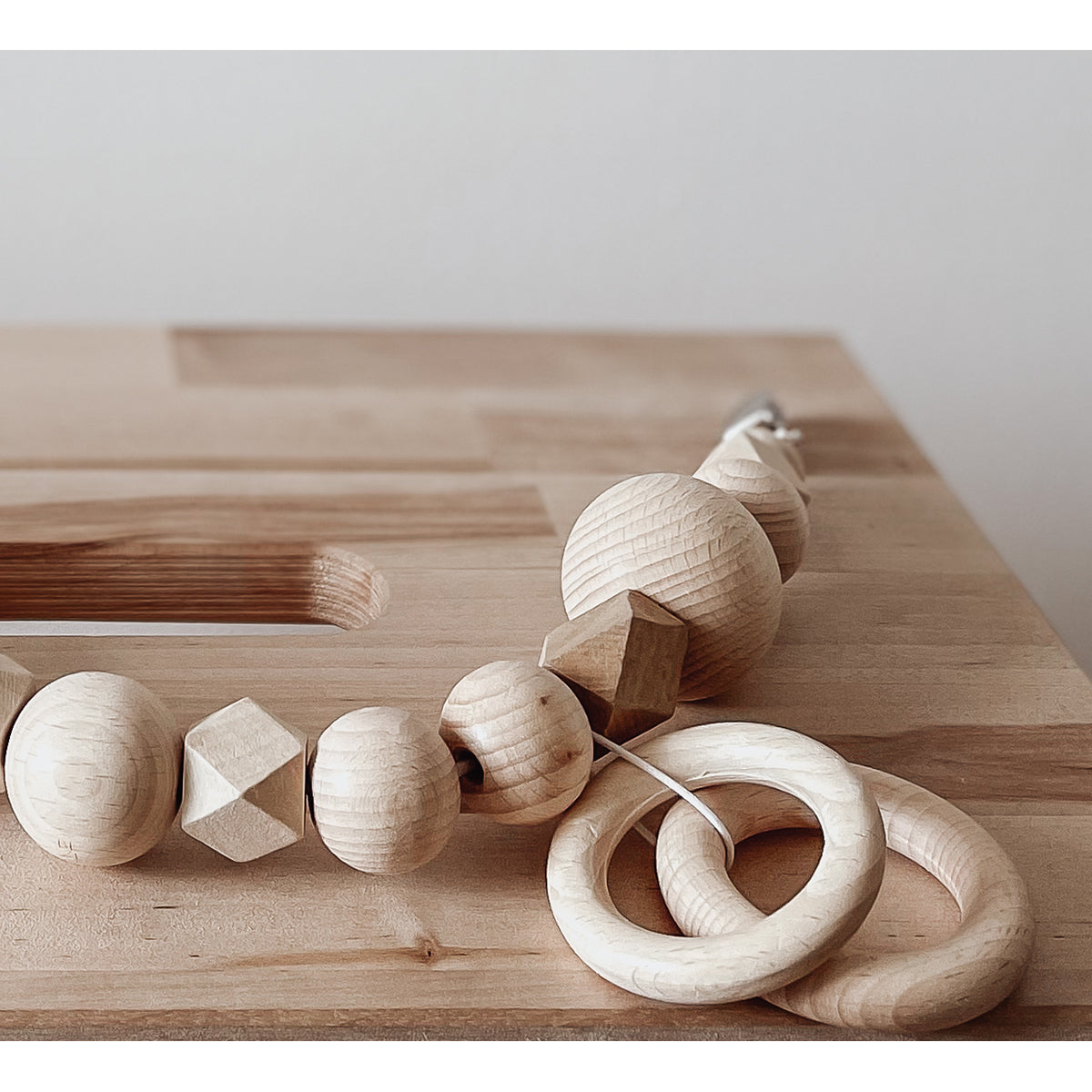 Bezisa Wooden Basics Pramstring in natural colour