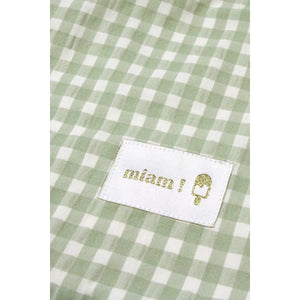 Barnabé Aime Le Café Elastic Towel Bib in green gingham