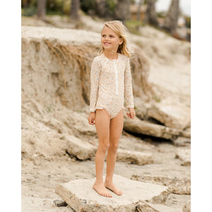 Rylee + Cru Rash Guard One Piece featuring a 'blossom' all over print on ivory for toddlers and kids/children