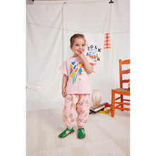 Load image into Gallery viewer, Bobo Choses Fireworks Ruffle T-Shirt with back button fastening for babies and toddlers