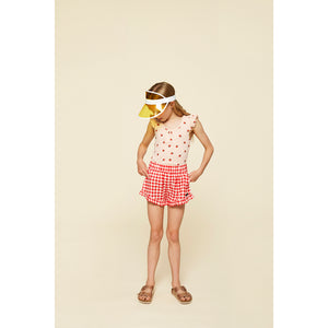 A Monday Pearl Shorts in a red and white gingham pattern for kids/children and tweens