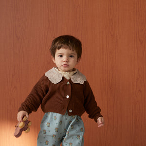 The New Society Baby Cardigan with front buttons