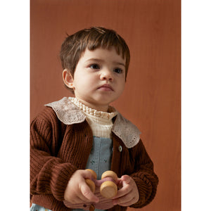 The New Society Baby Cardigan with front buttons