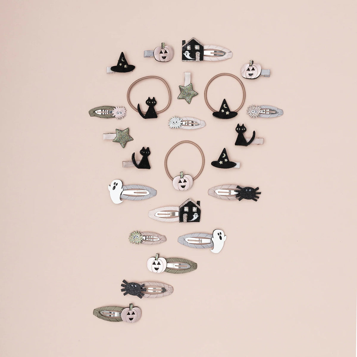 Spooky Halloween Ponies with hats, cats, pumpkins and stars crafted from soft leatherette fabrics in a mix of plain, glitter and metallic finishes from Mimi & Lula
