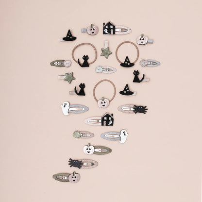 Spooky Halloween Ponies with hats, cats, pumpkins and stars crafted from soft leatherette fabrics in a mix of plain, glitter and metallic finishes from Mimi & Lula