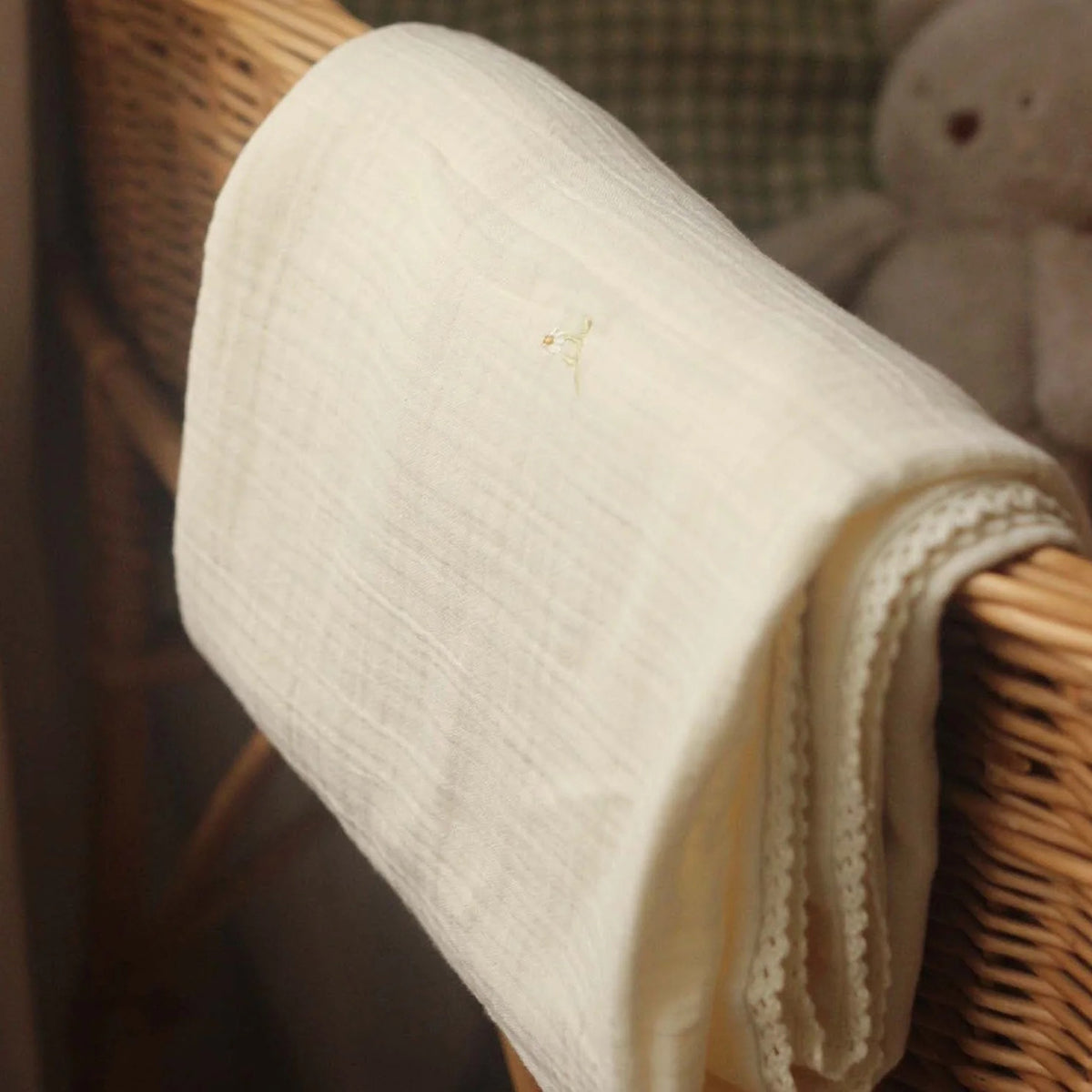 Wild Chamomile Embroidered Floral Muslin blanket with a lace trim from Avery Row for newborns and babies 