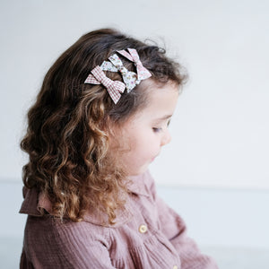 Mimi & Lula Pippa Bow Salon Clips in a mix of floral and gingham print fabrics secured to alligator clips