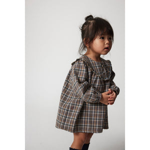 Cozmo Nuni Dress in a mixed plaid pattern  and long puffed sleeves for babies and toddlers