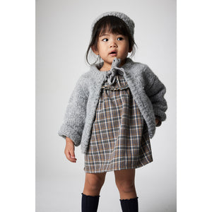 Cozmo Nuni Dress in a mixed plaid pattern for babies and toddlers