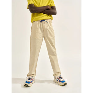 pharel pants/trousers with a higher waist and adjustable drawstring at the waist from bellerose for kids/children and teens/teenagers