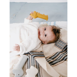 sustainable natural rubber baby toy mini dog sienna from We Are Gommu