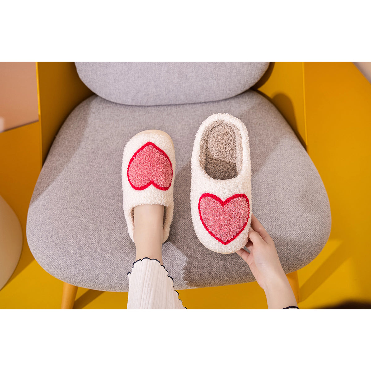 Shop Lev Big Heart Slippers for adults