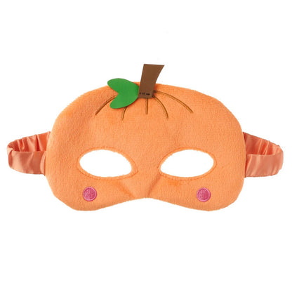 Pumpkin-shaped mask with a green leaf next to a stem on a white background
