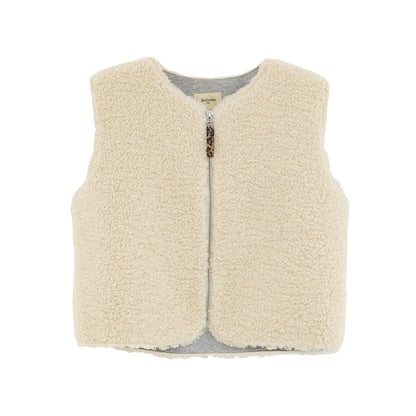 Product picture of Jams Bodywarmer front side from Bellerose. Bodywarmer is sleeveless, made from off-white teddy, featuring a light grey fleece lining and has a front zipper closure.