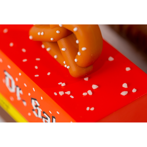 orange, yellow, brown toy pretzel van for kids from candylab