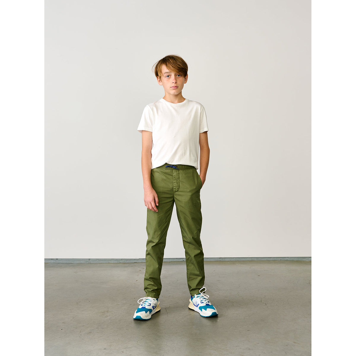 green pharel trousers in colour army in a cotton blend fabric from bellerose for kids