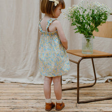 Load image into Gallery viewer, floral print Daisy Chain Dress with Shirred elastic rows around the top and ruffle detail from nellie quats for toddlers, kids/children