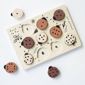 explore numbers with the wooden tray puzzle - count to 10 ladybugs from wee gallery for kids