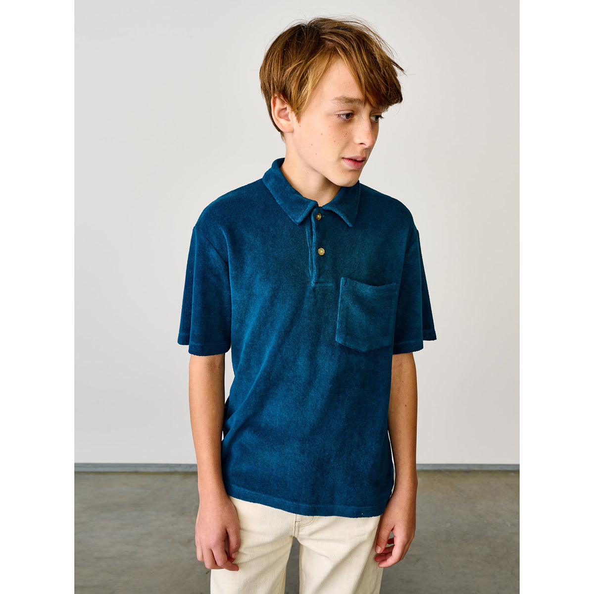 classic sponge cotton blend polo in colour teal / blue with front patch pocket from bellerose for teens