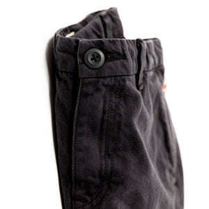cotton bill relaxed shorts in the colour washed black with pockets from ao76 for kids and teens