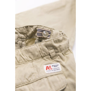 bill chino trousers in the colour light olive for kids and teens from ao76