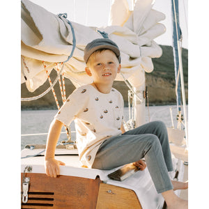 t-shirt with tugboats all-over print in the colour stone from rylee + cru with snap buttons on the shoulder for easy changing for babies and toddlers