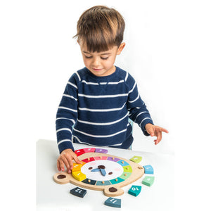 wooden clock for children to learn the time from tender leaf toys