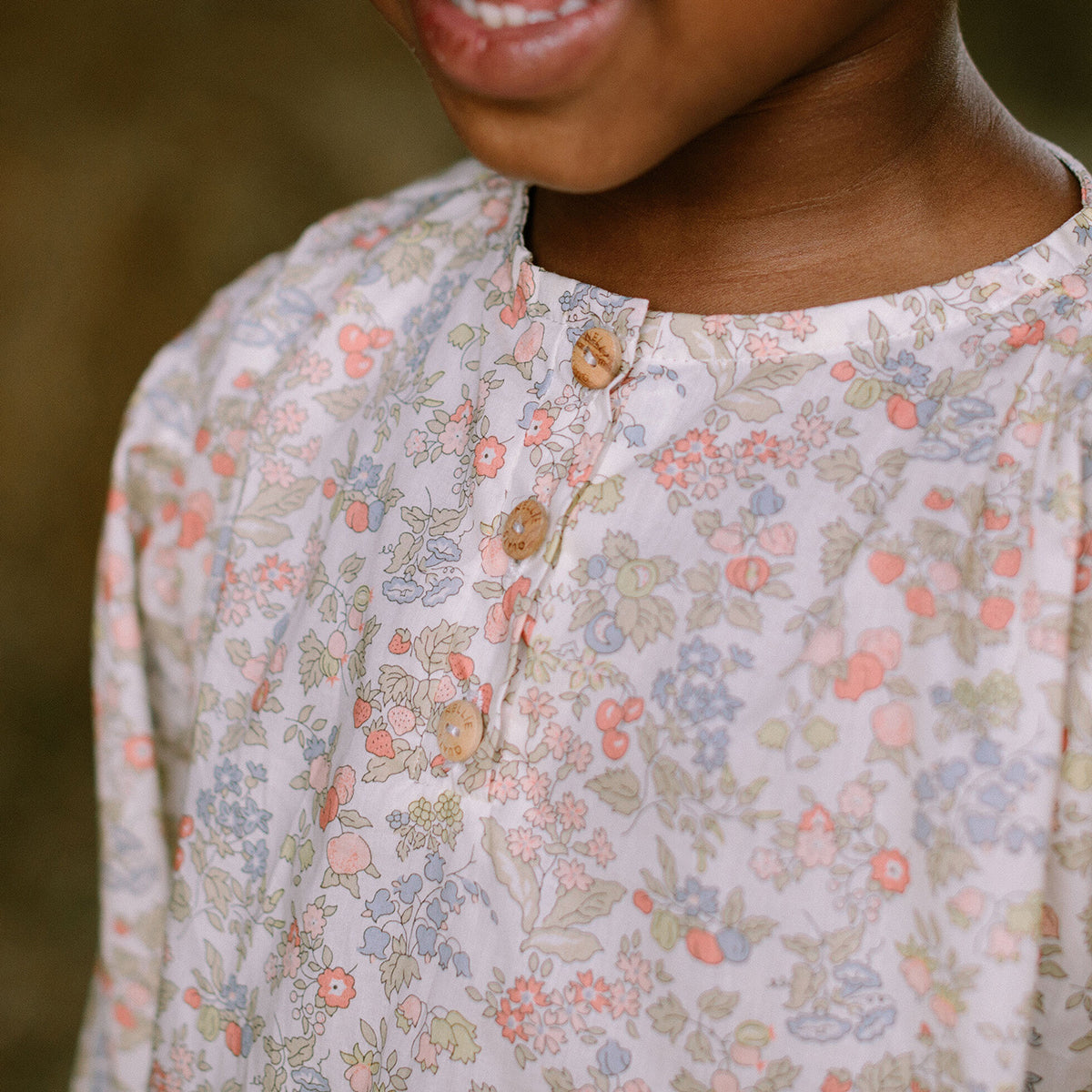 full length puffed sleeves with elasticated cuffs and front buttons on floral print mother may I blouse from nellie quats for toddlers and kids