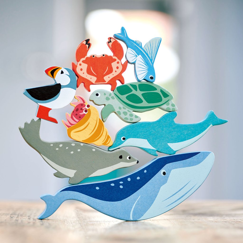 Wooden animals in a storage shelf from tender leaf design