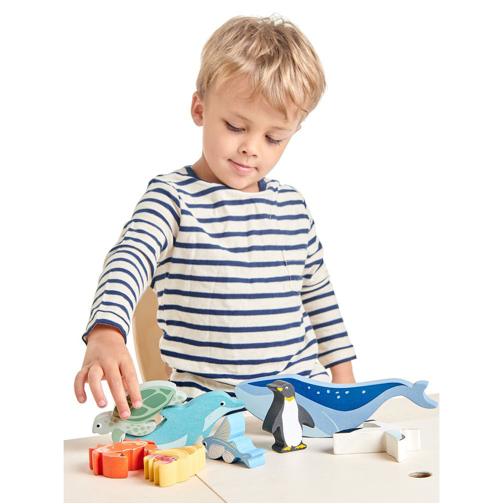 Ten wooden sea creature animal toys with a shelf from Tender Leaf Toys