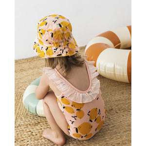 lemon print bob hat/bucket hat in the colour peach for babies and toddlers from búho