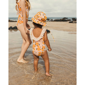 organic cotton bucket hat/bob hat with lemon print from búho for babies and toddlers