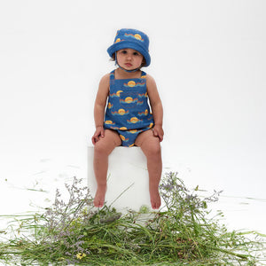 blue organic cotton baby bubble summer romper with a rainbow sunset print