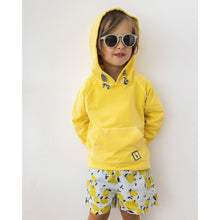 Load image into Gallery viewer, lemon print swimsuit/swim shorts with an elasticated waistband from búho for toddlers and kids/children