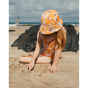 Lemon print Maillot in the colour peach from búho for toddlers and kids/children