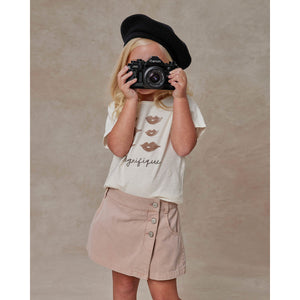 basic tee with a 'magnifique' graphic front print on short-sleeved ivory t-shirt for toddlers and kids from rylee + cru