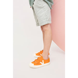 orange kids shoes with velcro from veja